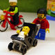 Illustration for article titled Legos First Minifigure in a Wheelchair is Embarrassingly Overdue